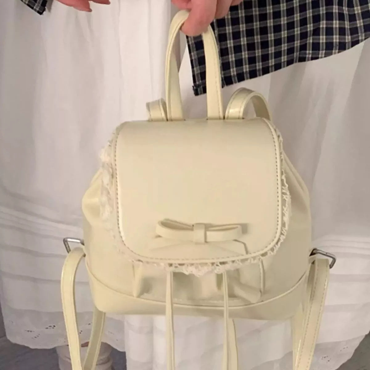 Gray and white lace trim mini backpack view