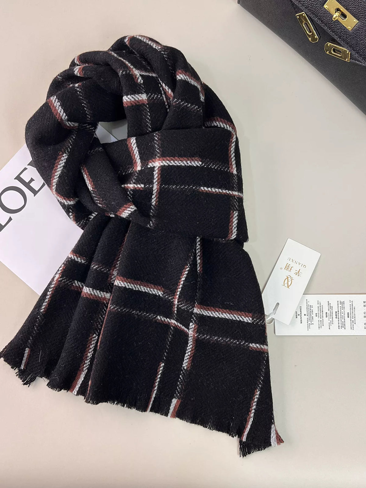 Raw hem wool scarf shown in natural light