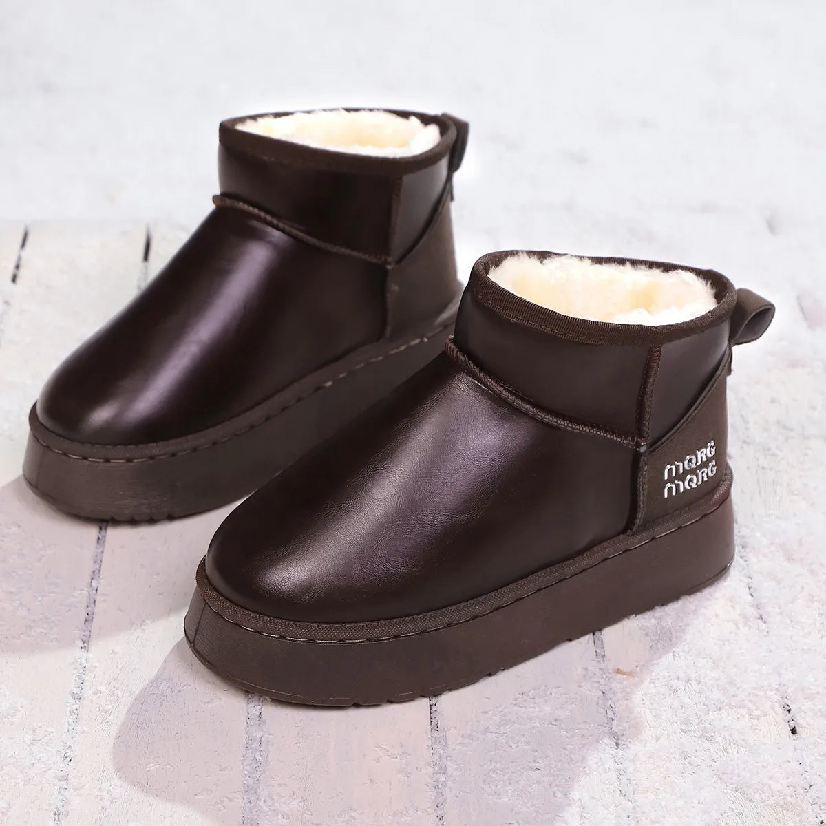 Faux fur platform ankle boots pair standing