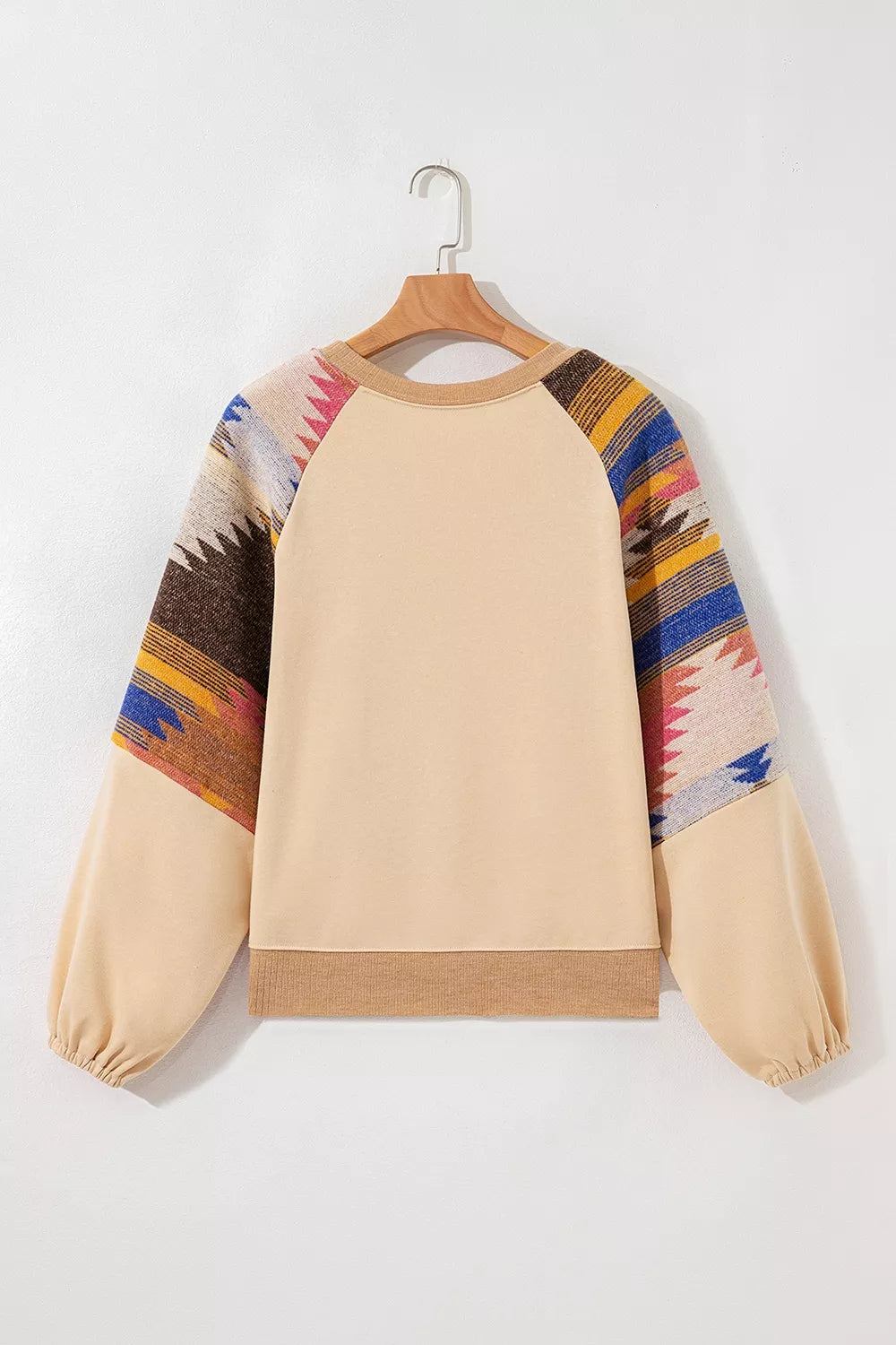Back view of the tan western graphic sweatshirt