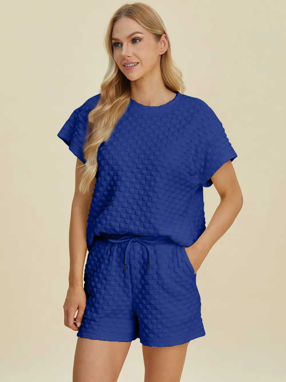 Seated view of the tee and shorts set
