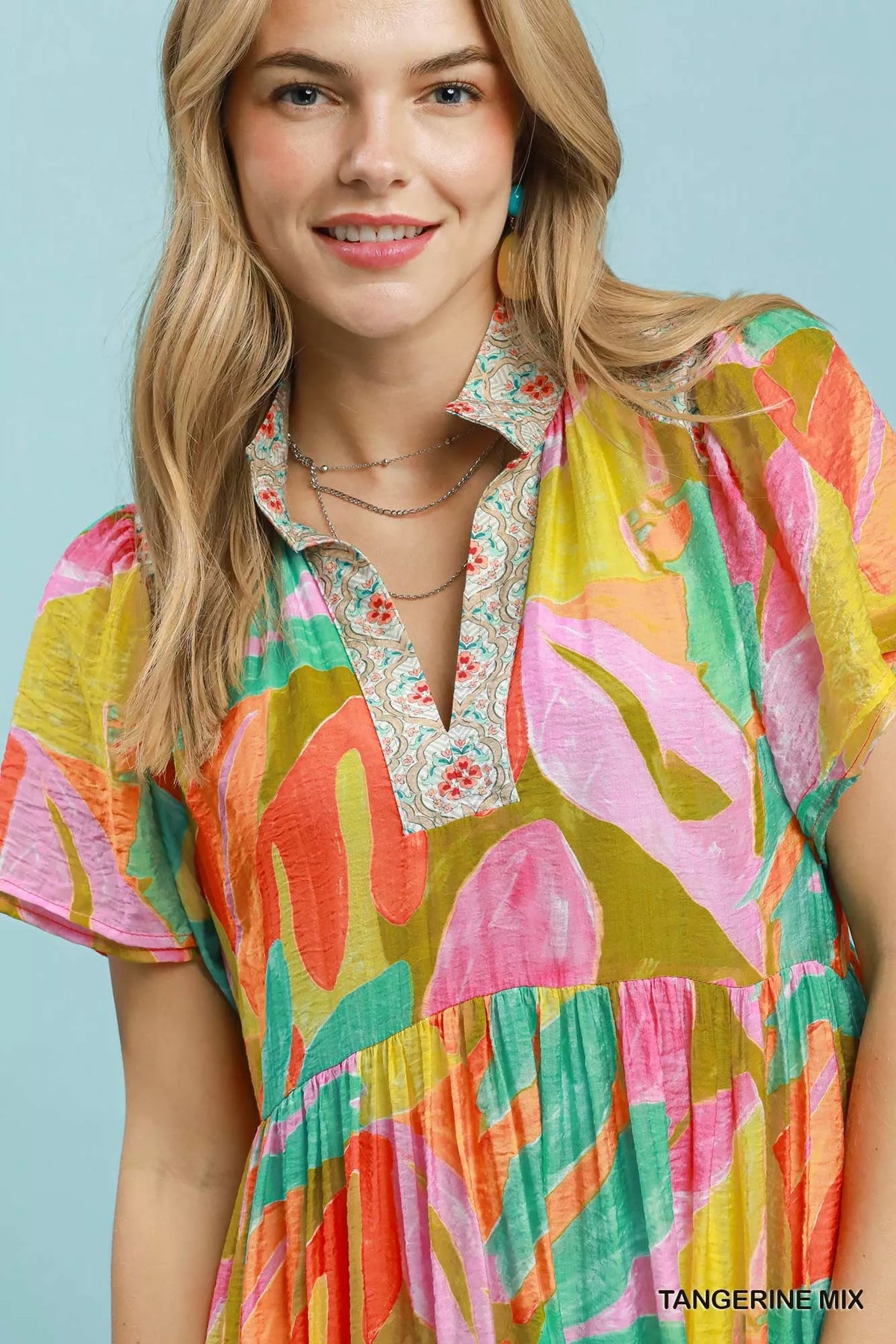 Tangerine abstract print short sleeve midi dress back view
