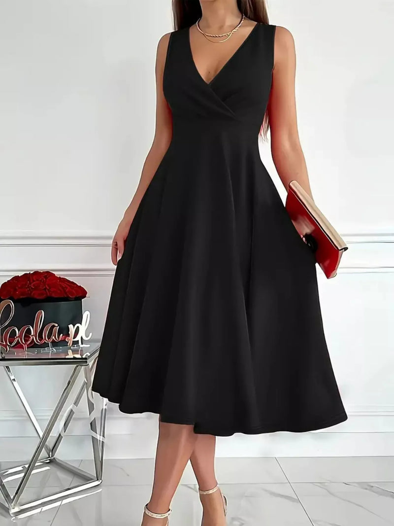 Sleeveless A line midi dress shown full length from the front