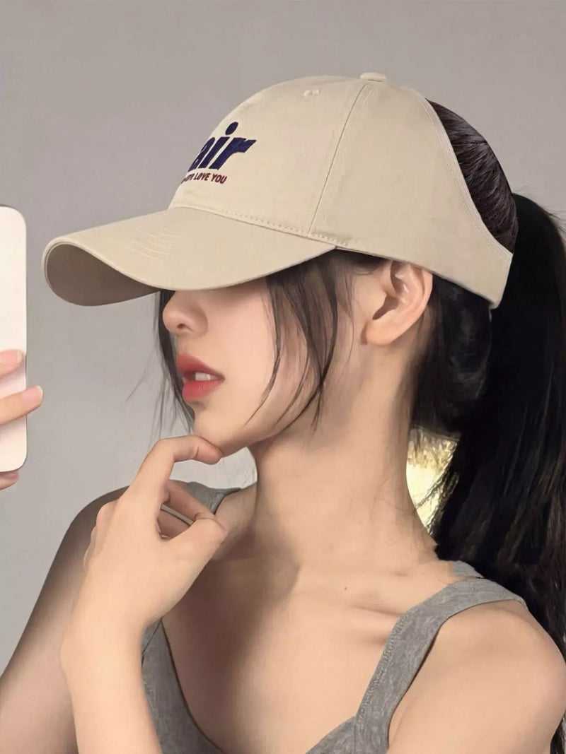 Embroidered letter baseball cap, front view