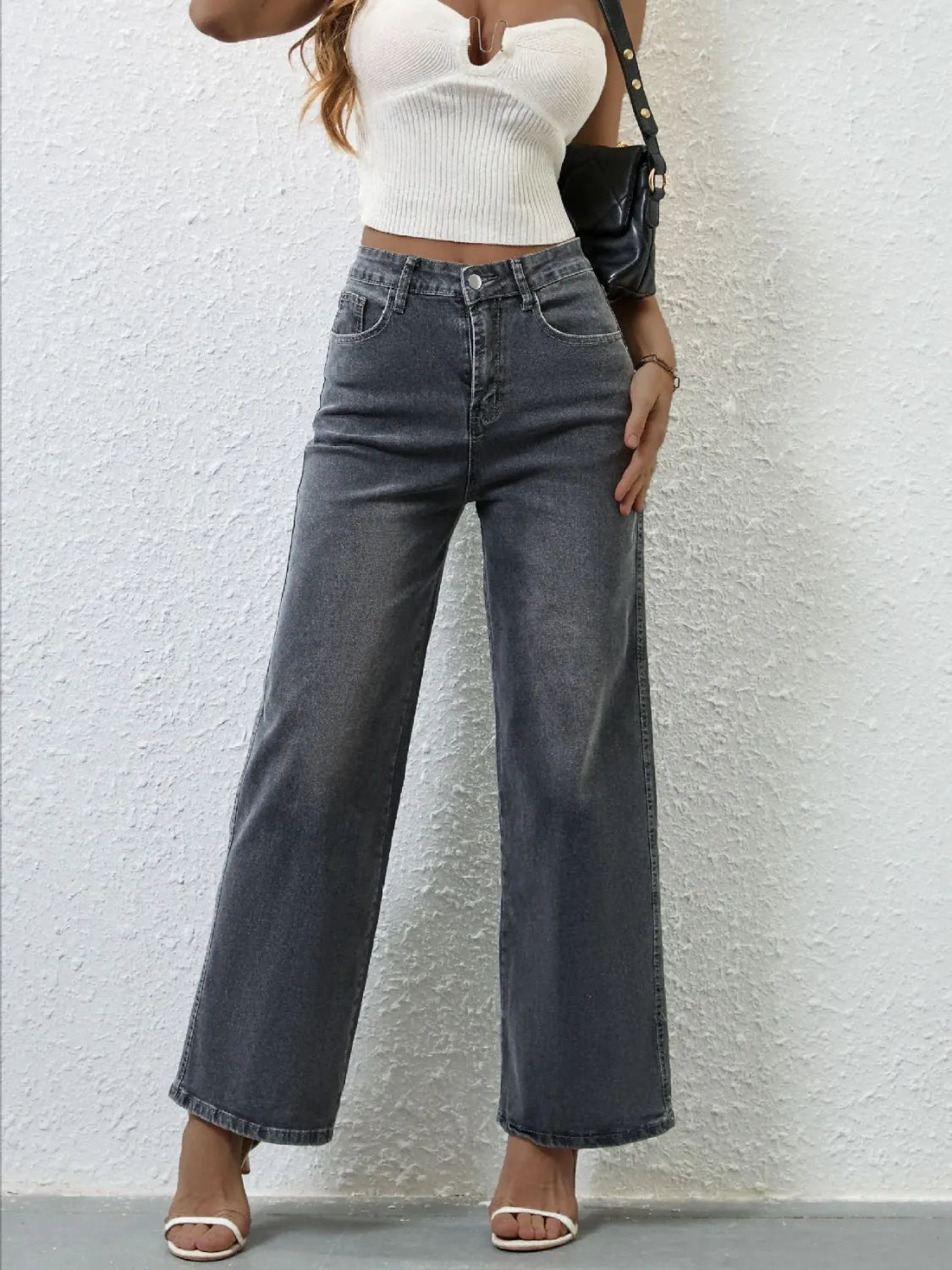 Pocket detail on high rise wide leg jeans