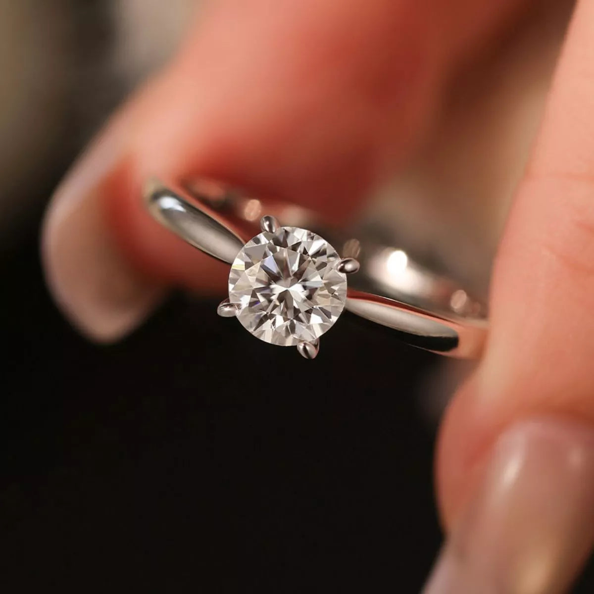 Overhead view of the solitaire moissanite silver ring