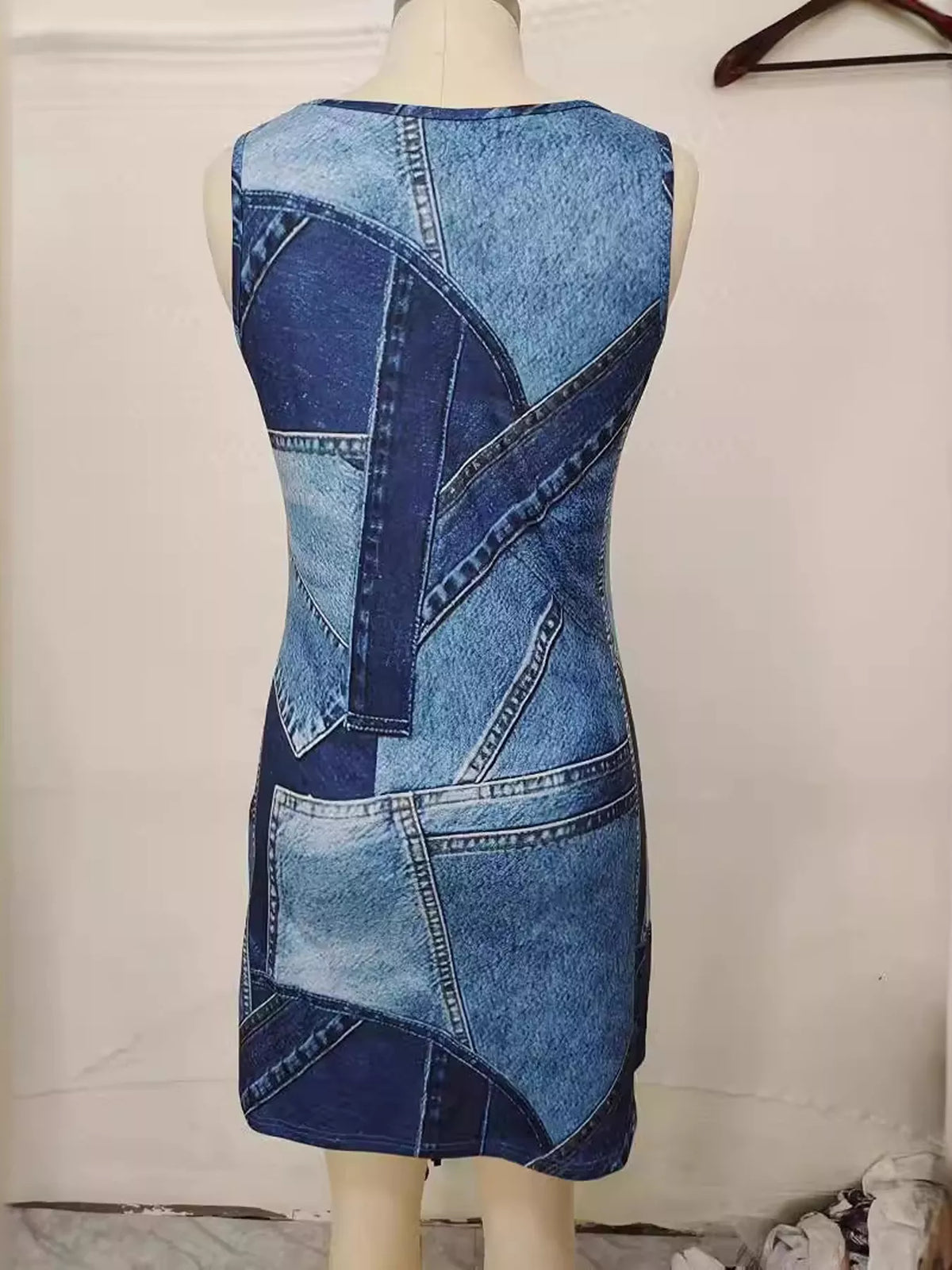 Denim print tank dress shown at a side angle