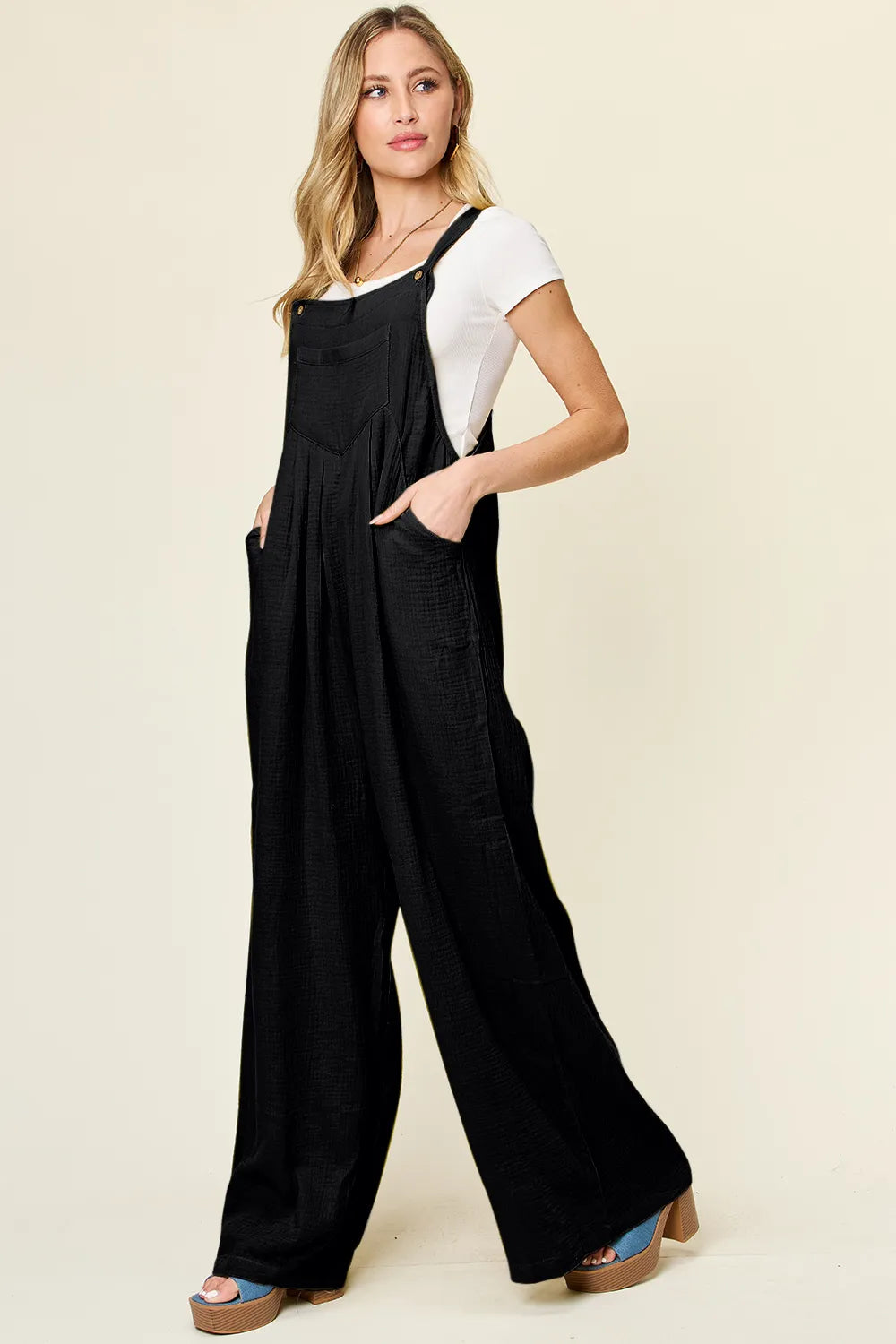 Wide strap black overalls side view