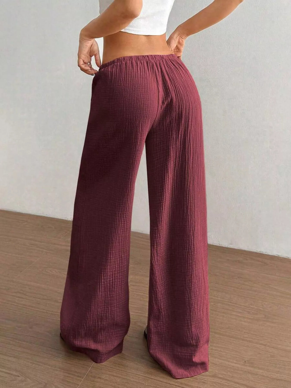 Drawstring pants shown in a soft pink shade