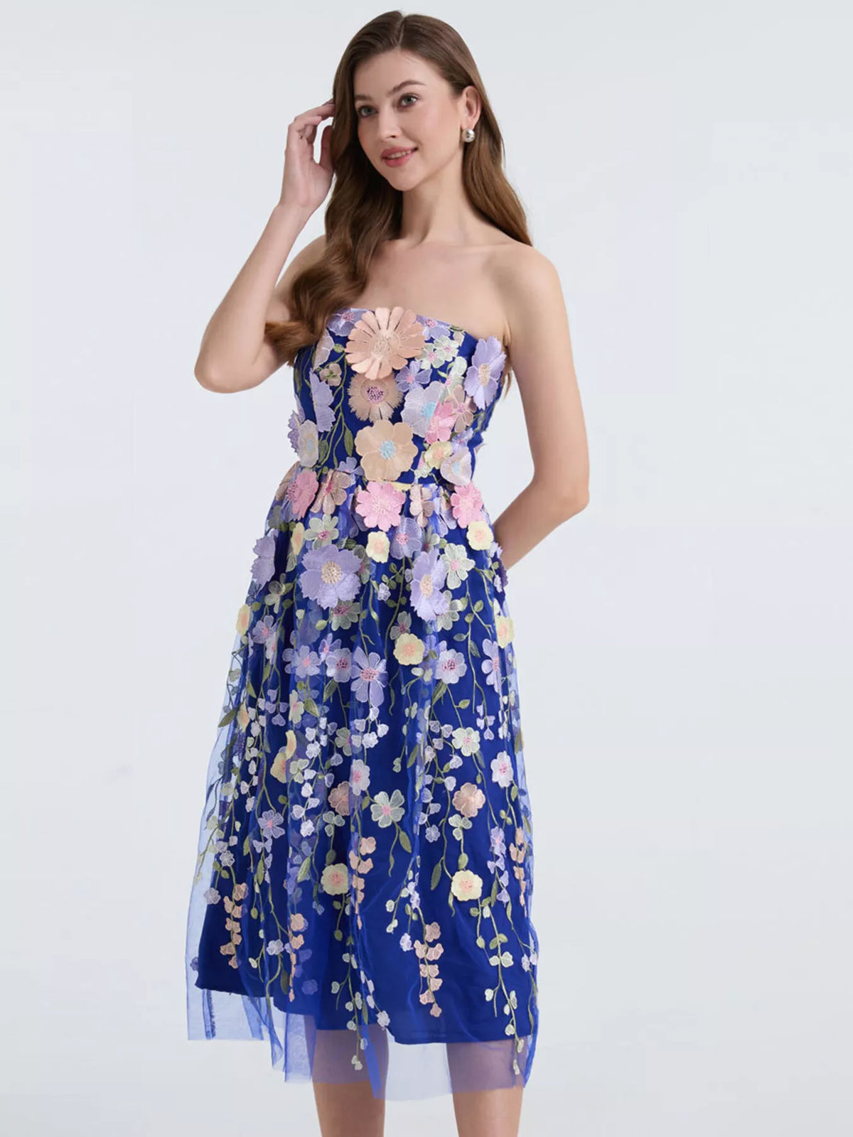 Strapless midi dress worn with heels