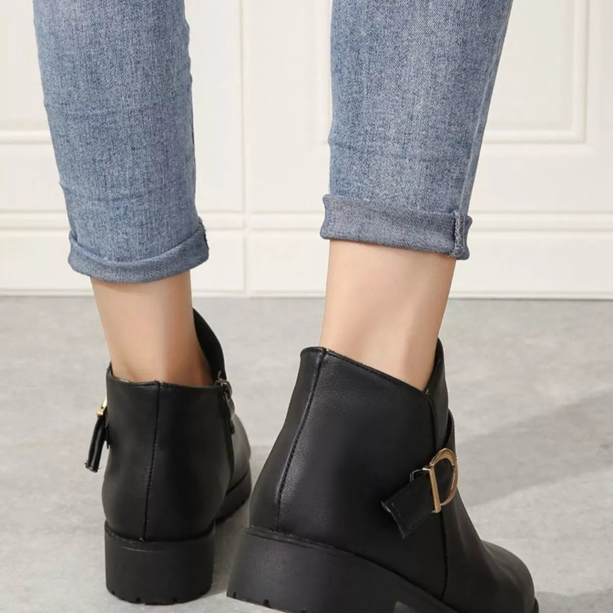 Buckle accent ankle boots close up of the toe