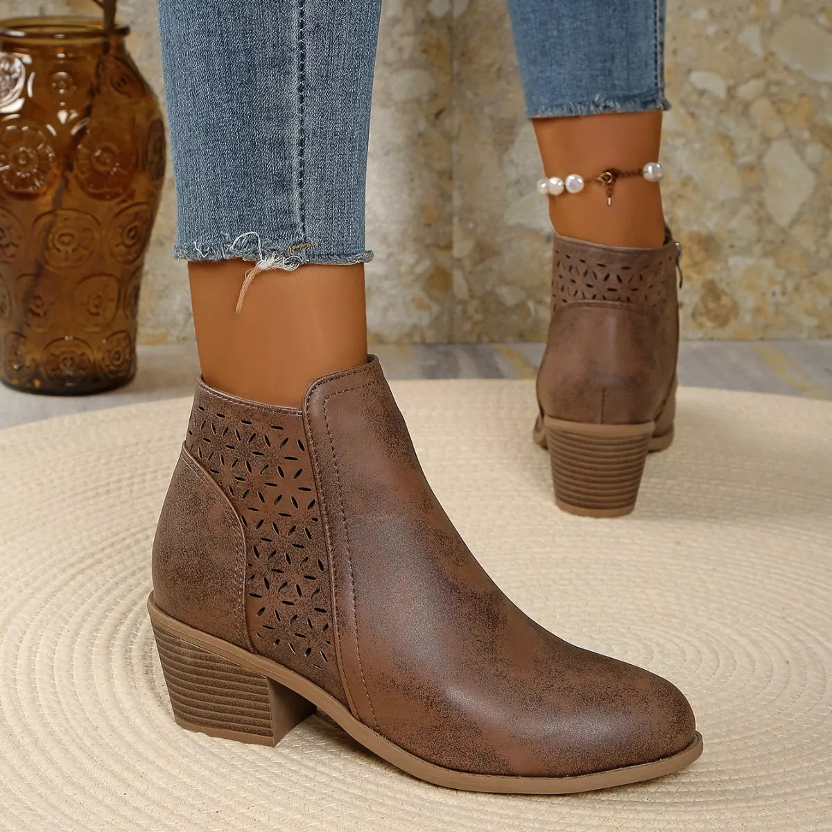 Point toe block heel boots detail of the trim