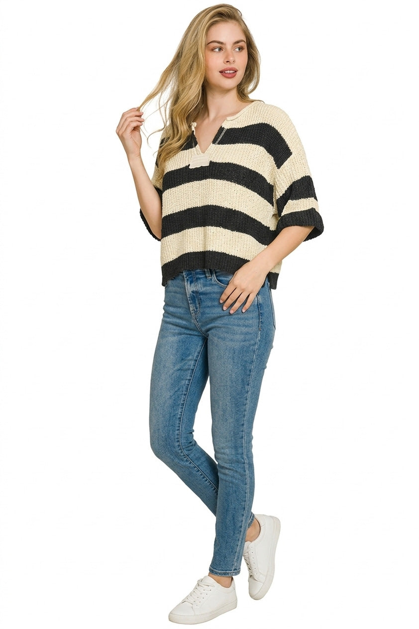 Split neckline detail on striped knit sweater