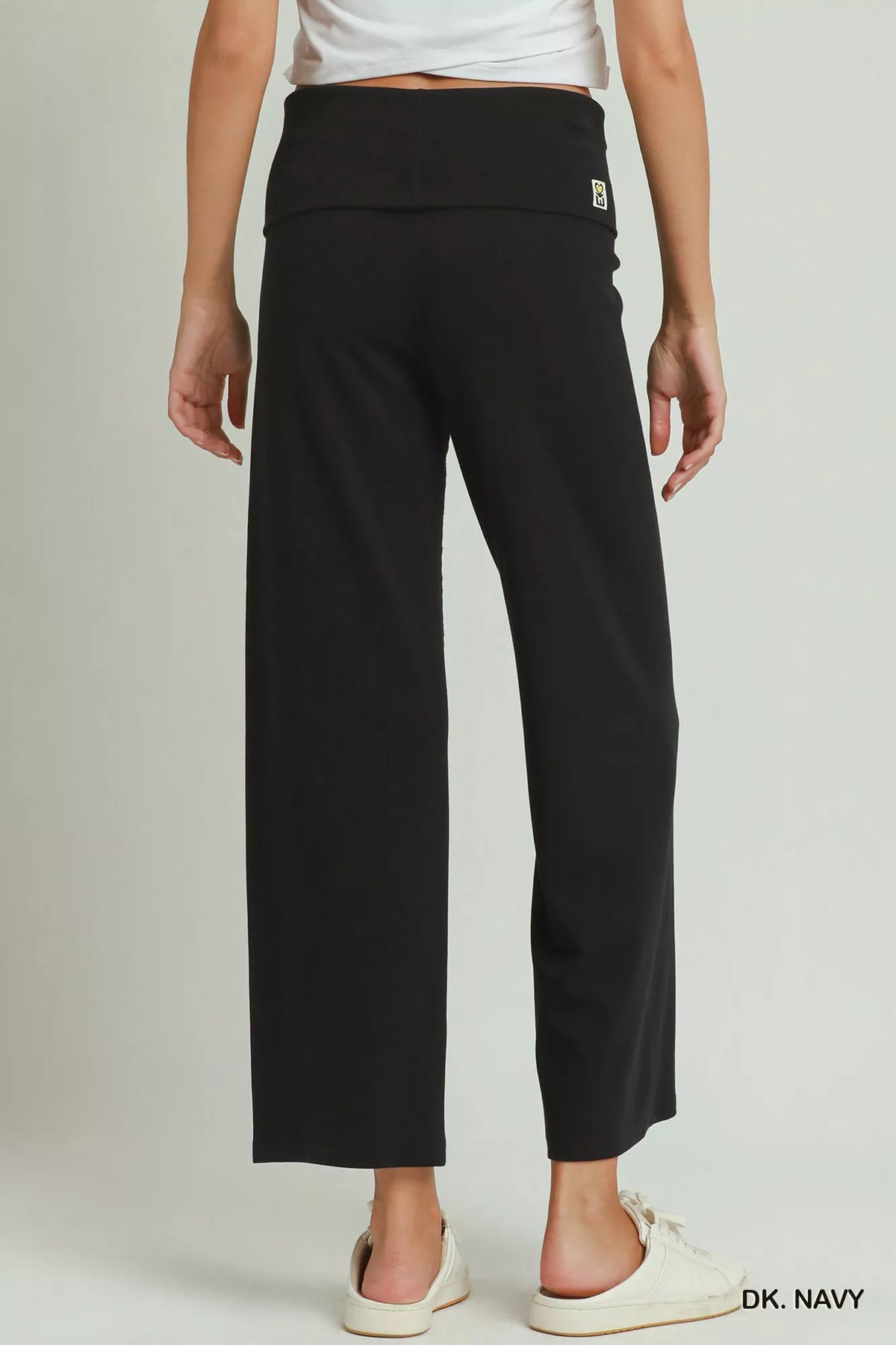 Side view of the straight leg trousers showing the drape