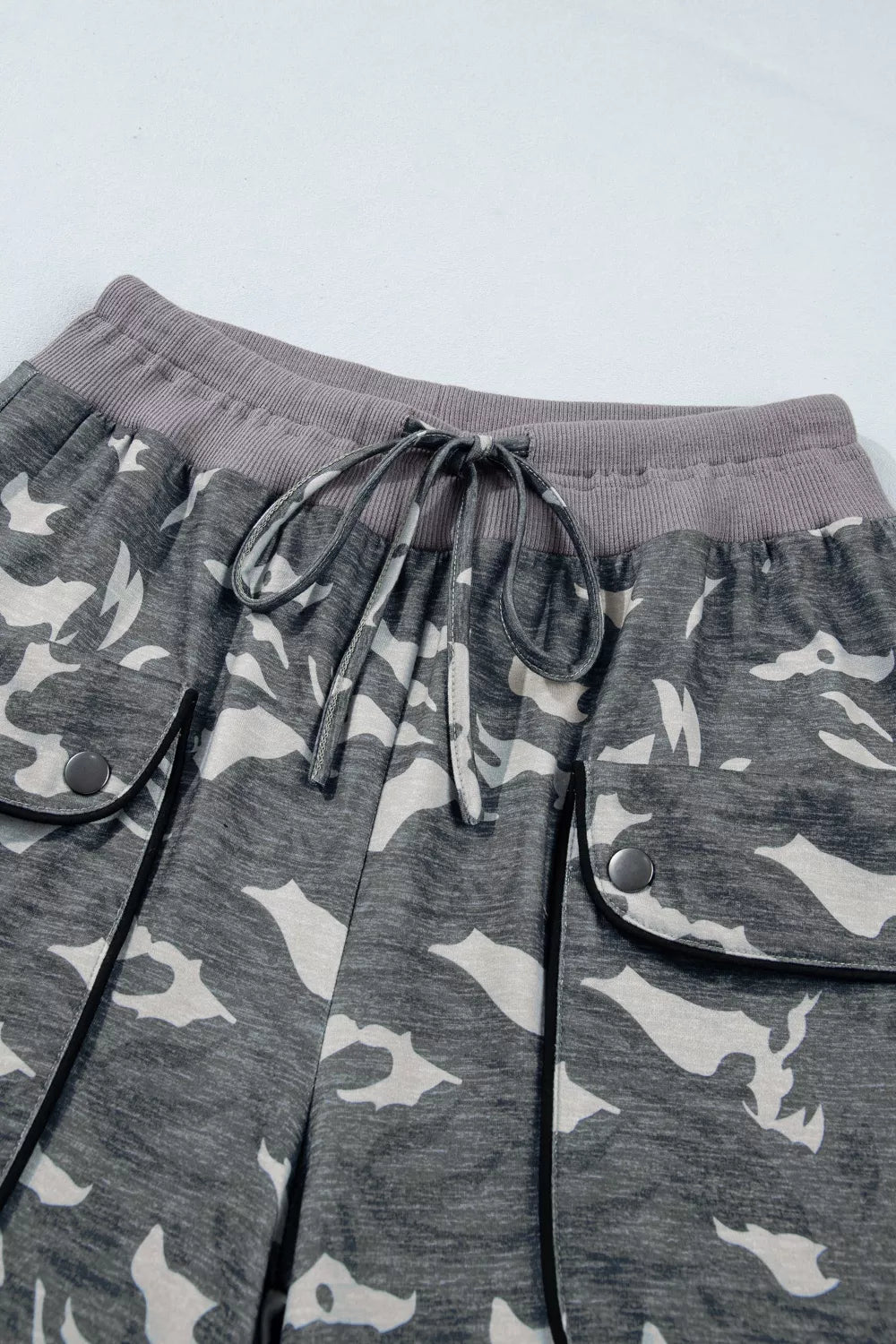 Camouflage cargo barrel pants angled view