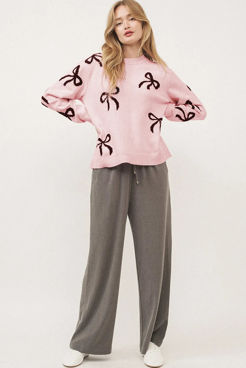 Loose fit blush sweater side view