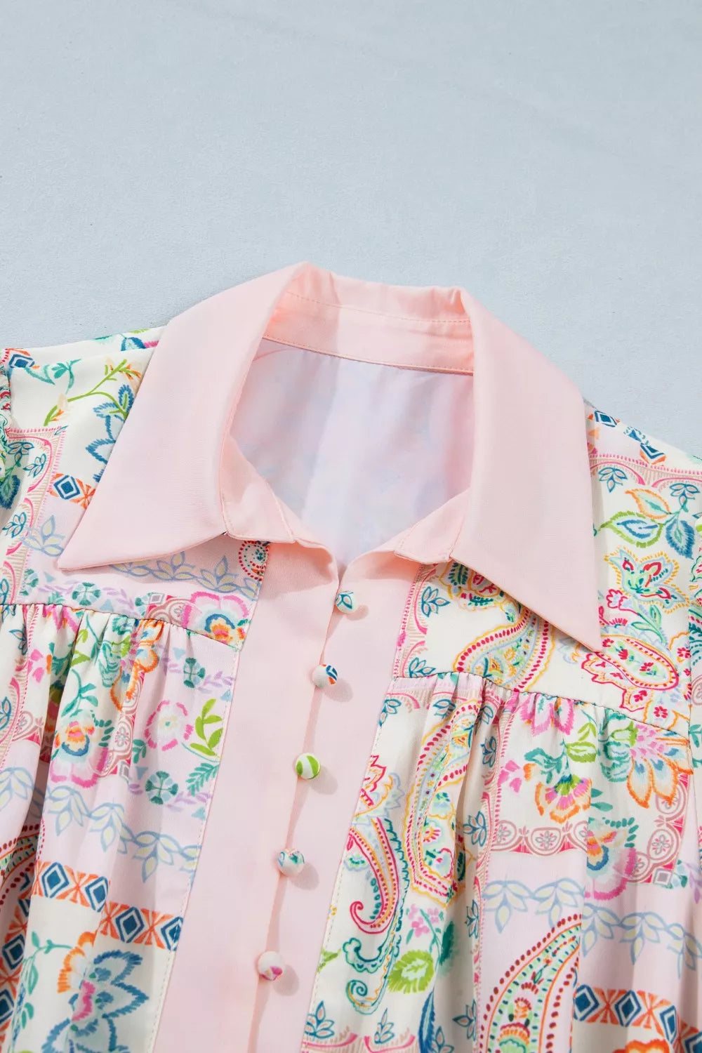 Blush pink floral print belted mini dress styled view