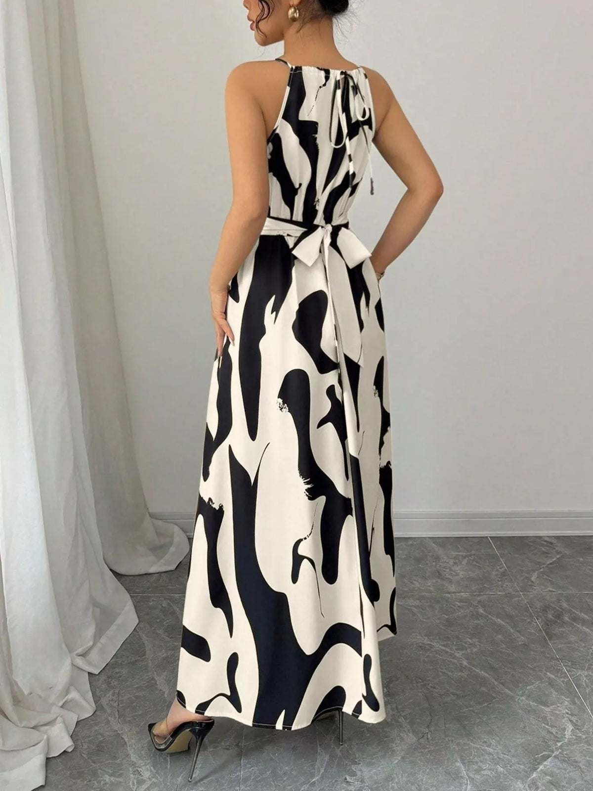 Abstract print halter neck maxi dress close up view