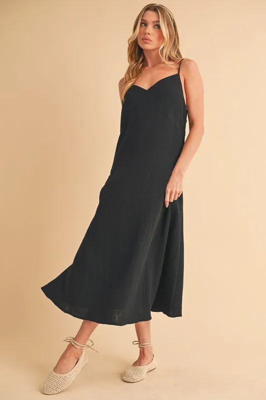 Midi cami dress showing the column silhouette