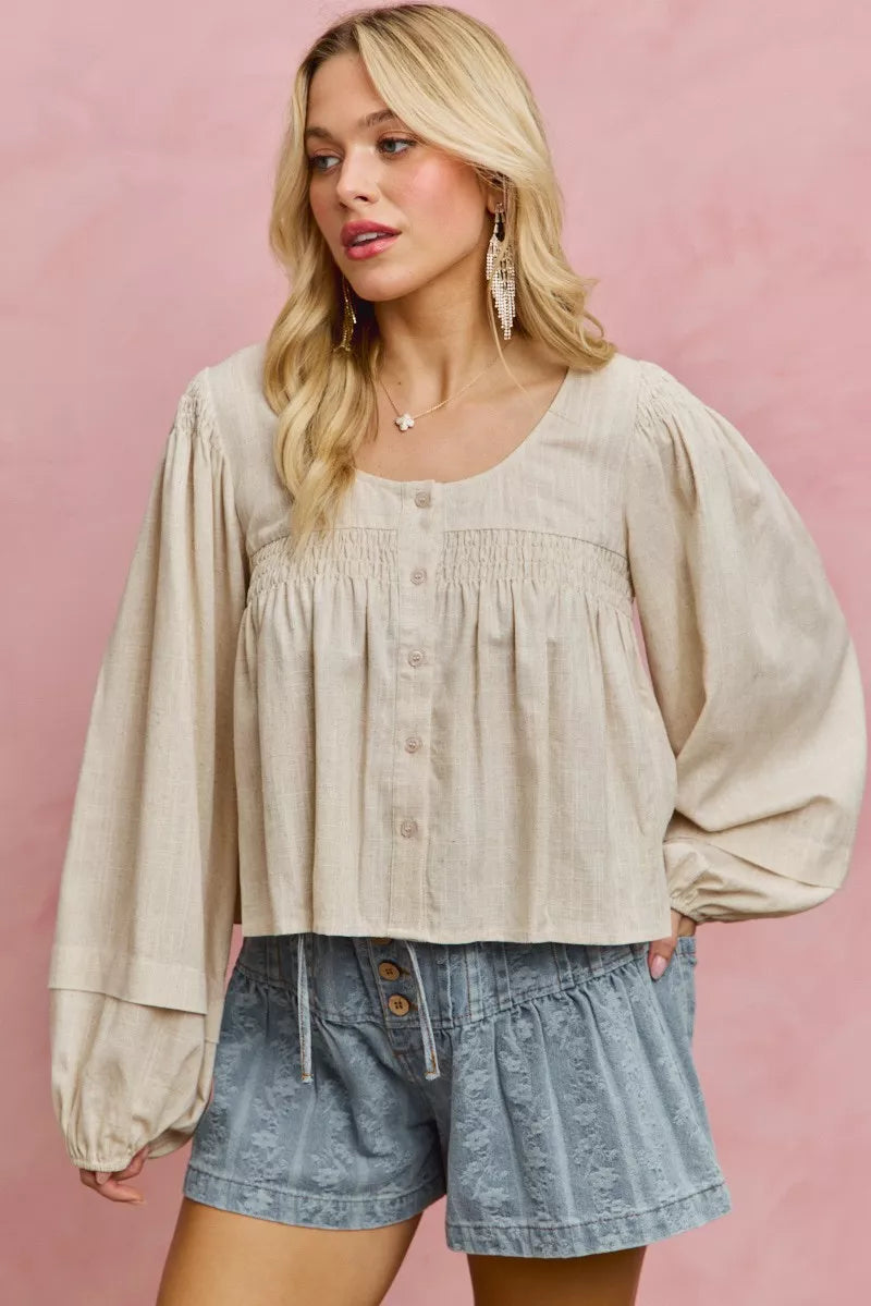 Cream linen blend smocked long sleeve top, full length view