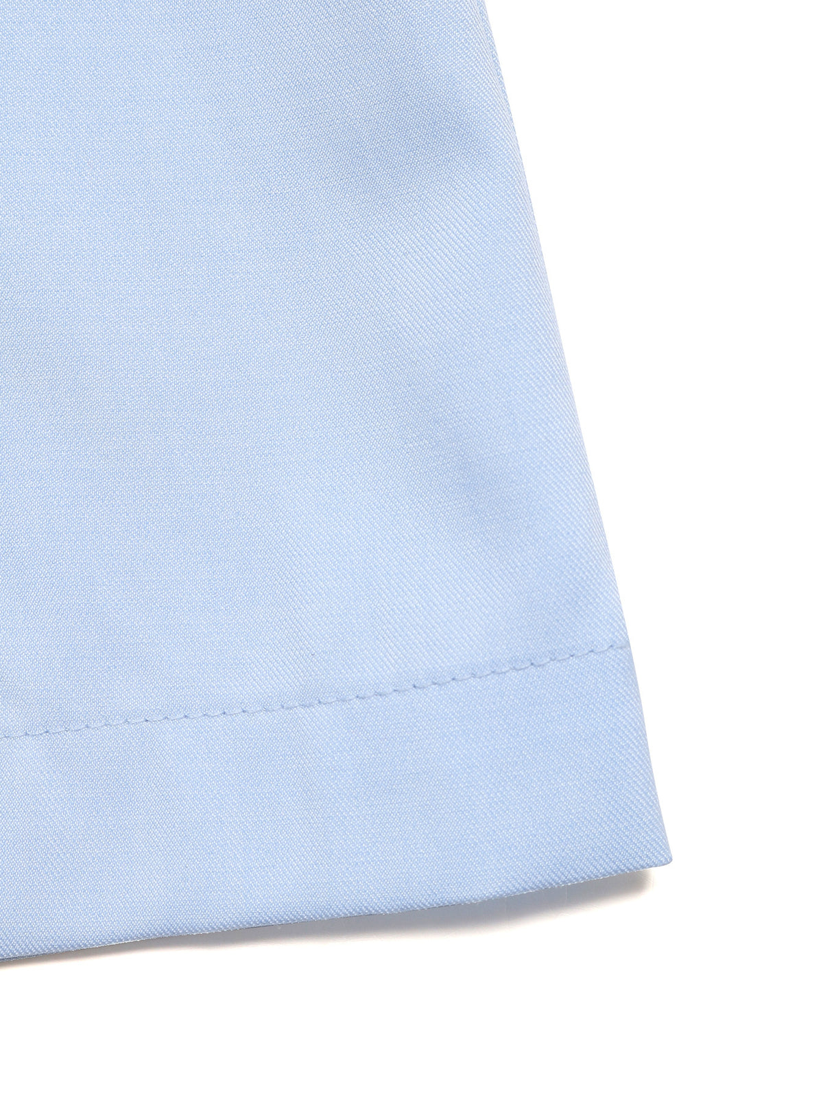 Full length styling view of the pleated high waisted shorts