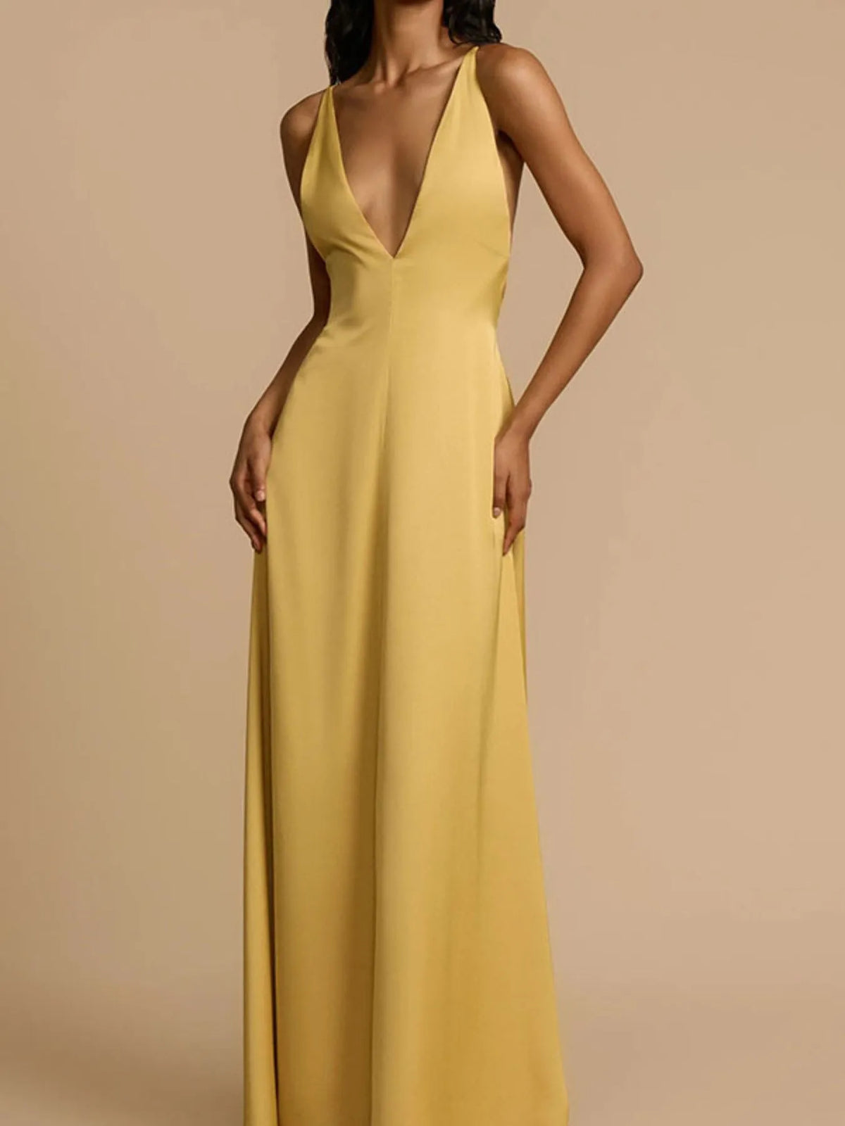 Deep V neck gold maxi dress side view
