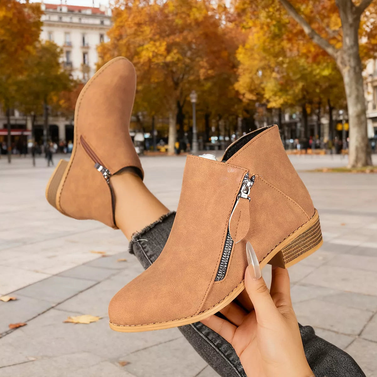 Side zip block heel boots studio flat lay