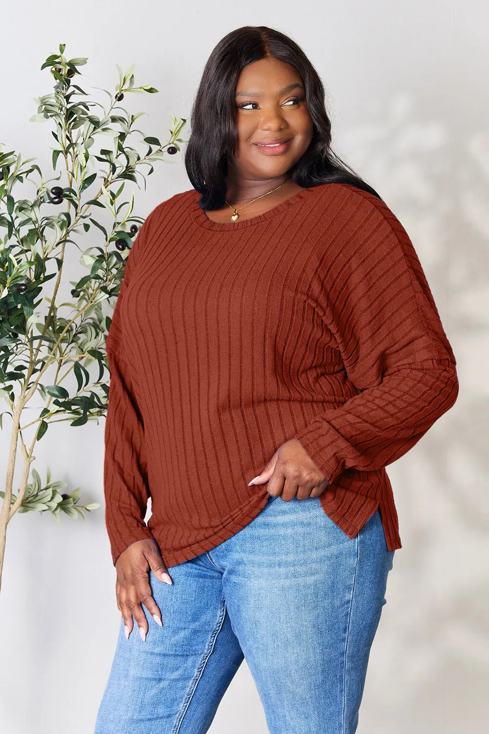 Detail of round neckline on ribbed top