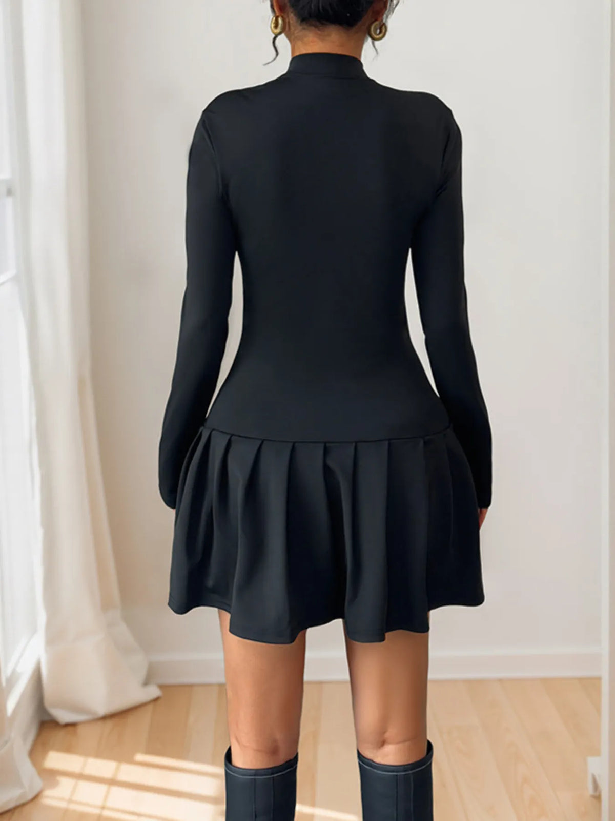 Black button mock neck long sleeve mini dress styled view