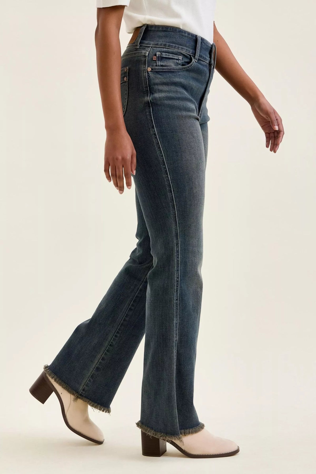 Frayed raw hem detail on Judy Blue jeans