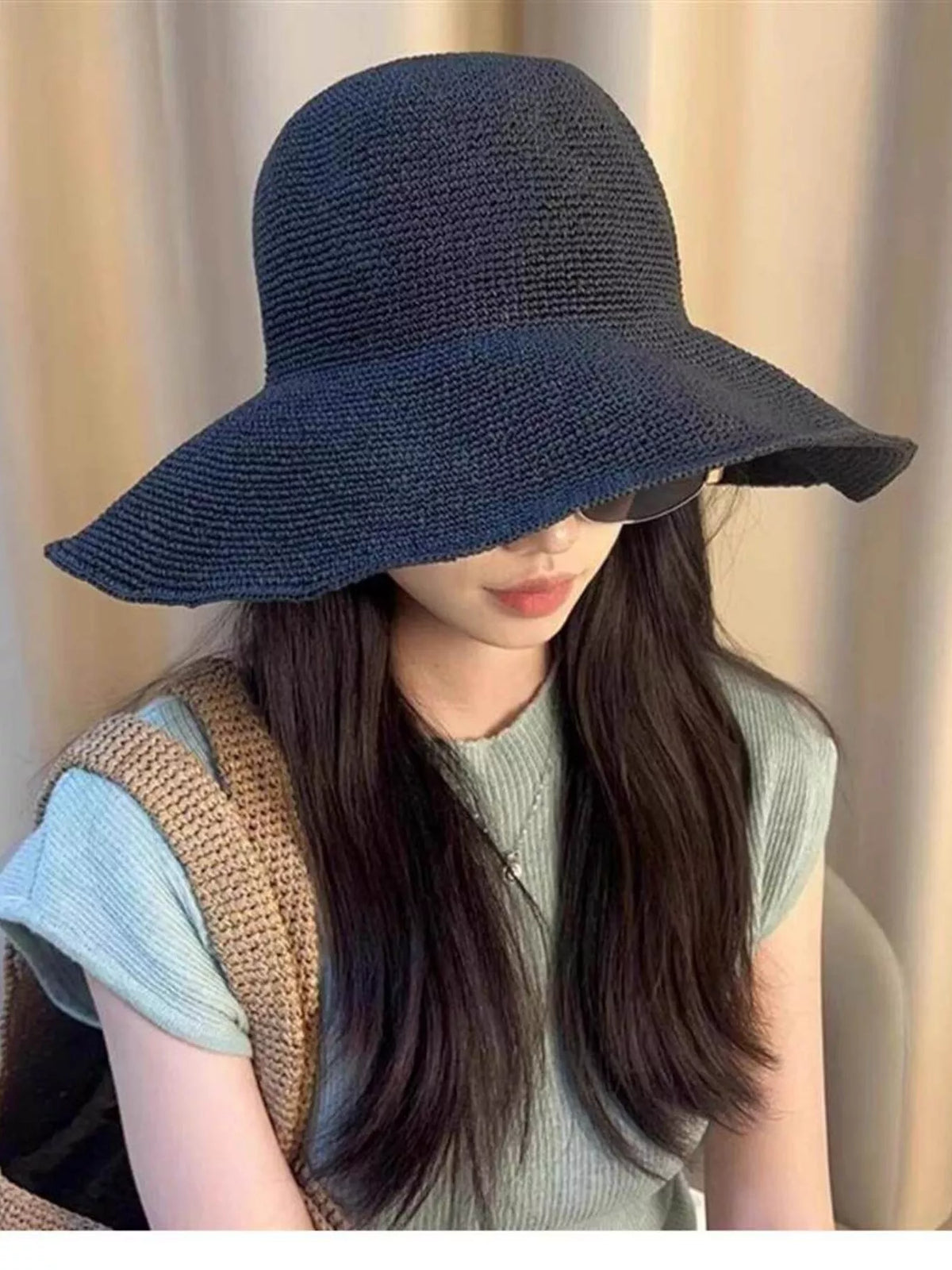 Sun hat shown from the side to show the brim
