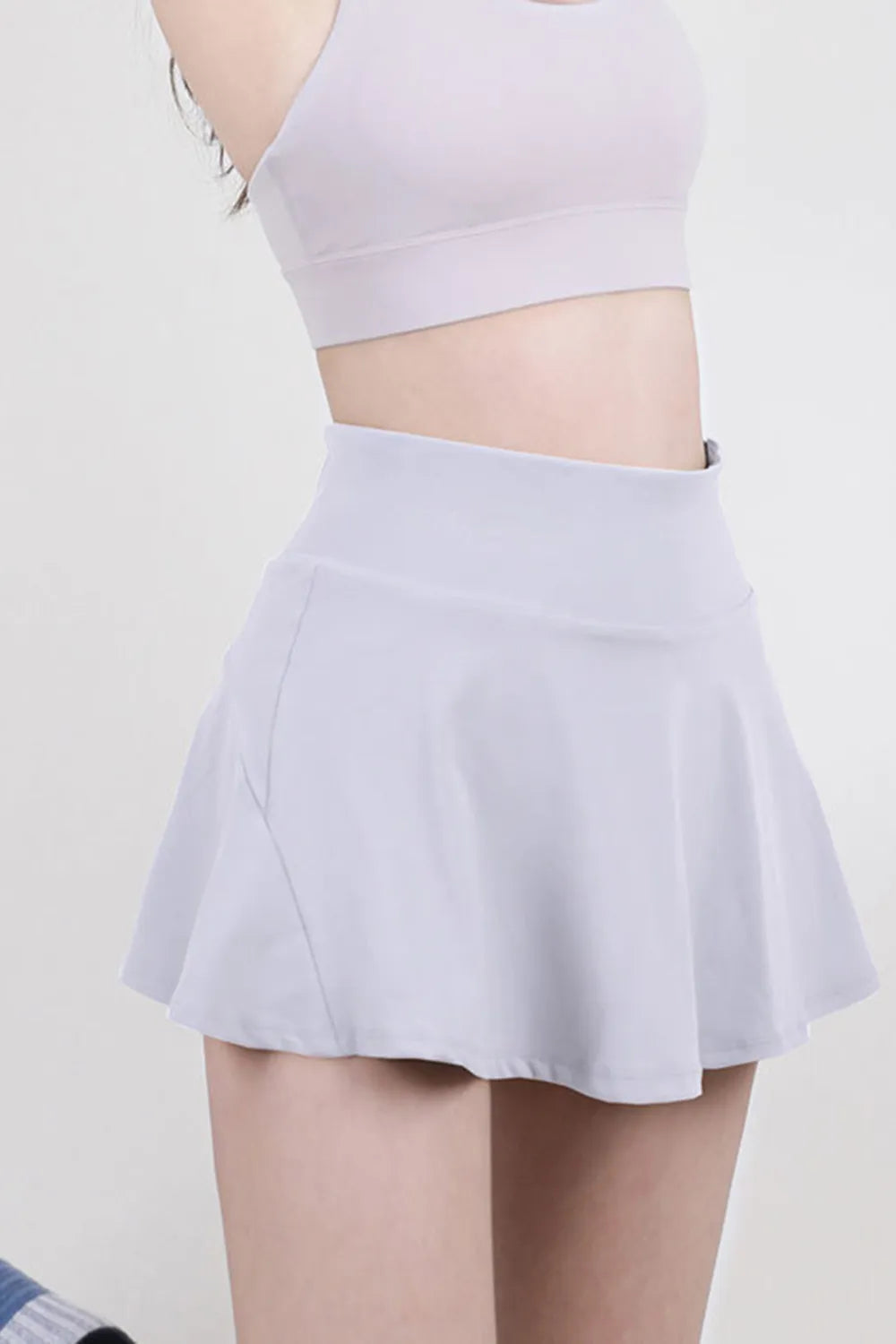 High waist pleated active skirt hem detail