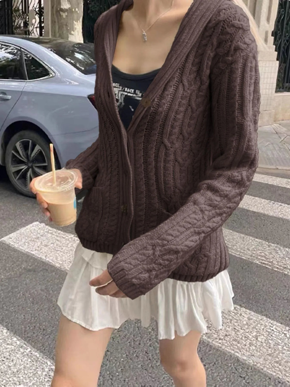 cable knit button up cardigan neckline detail