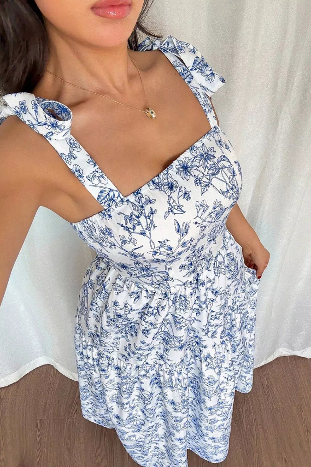 Light blue floral knot strap high waist flared maxi dress front view