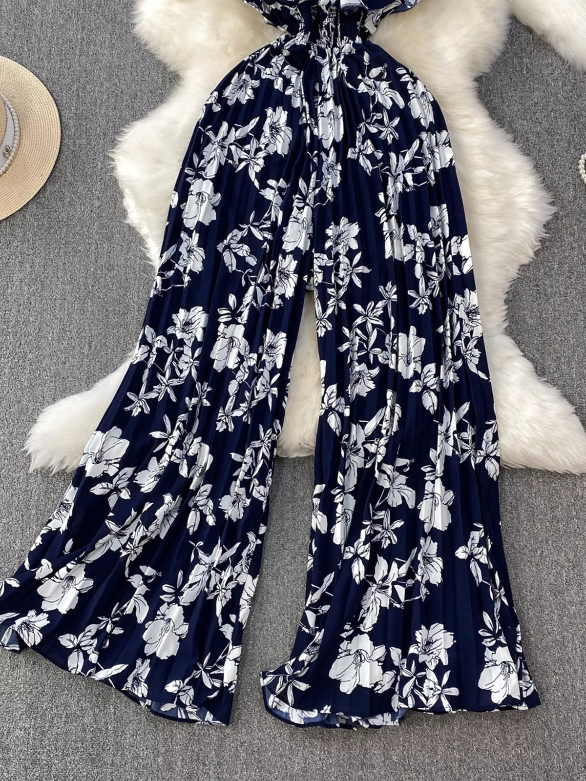 Floral print wide leg pleated jumpsuit detail view