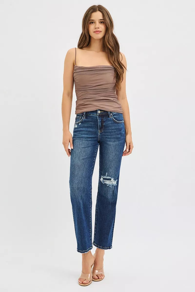 Model wearing RISEN dark wash straight leg jeans