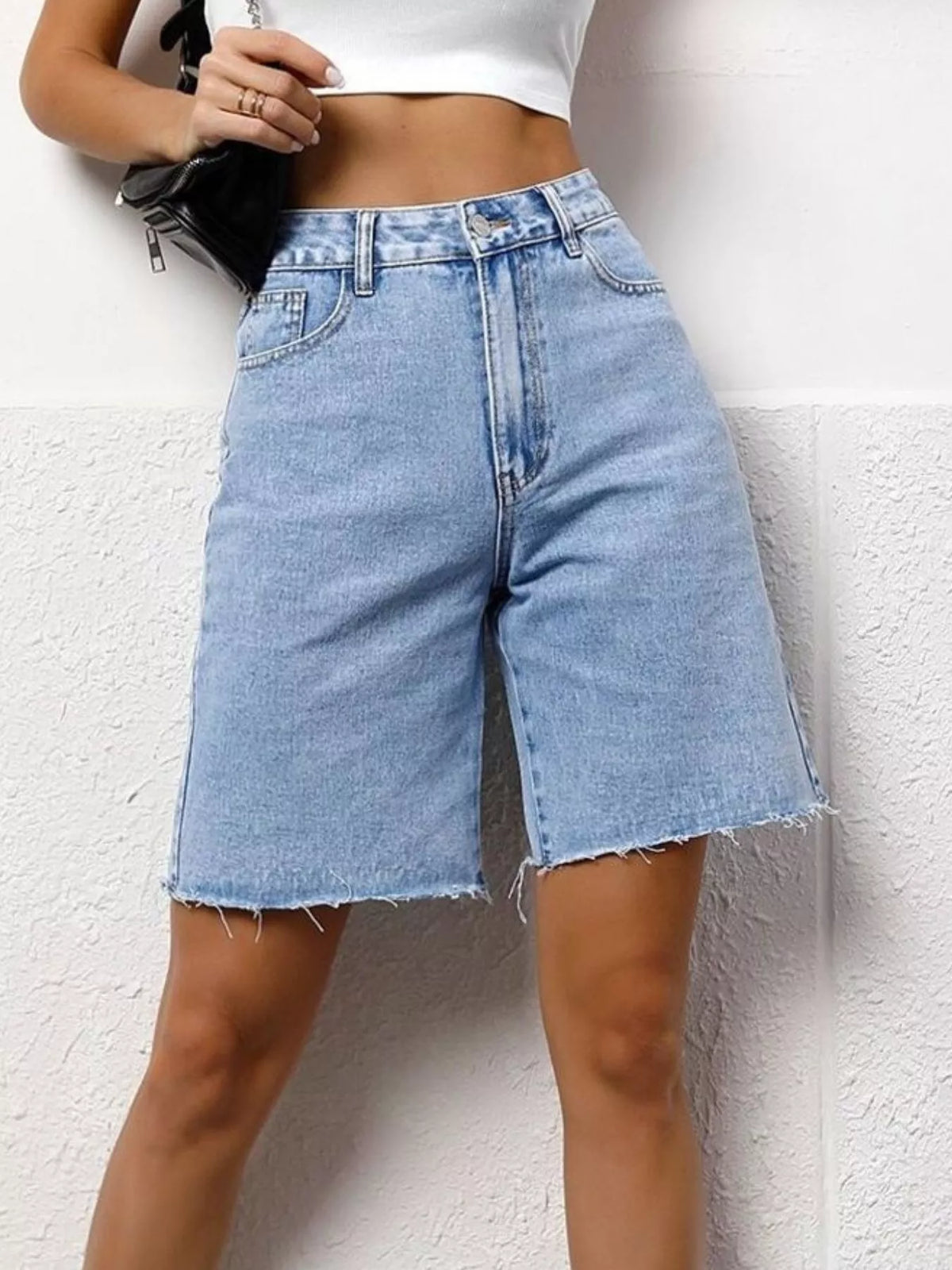 Blue high waist denim shorts side view