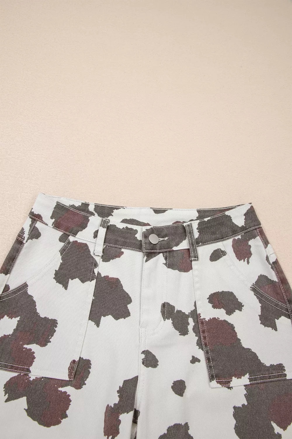 Full length styling of cow spot print denim