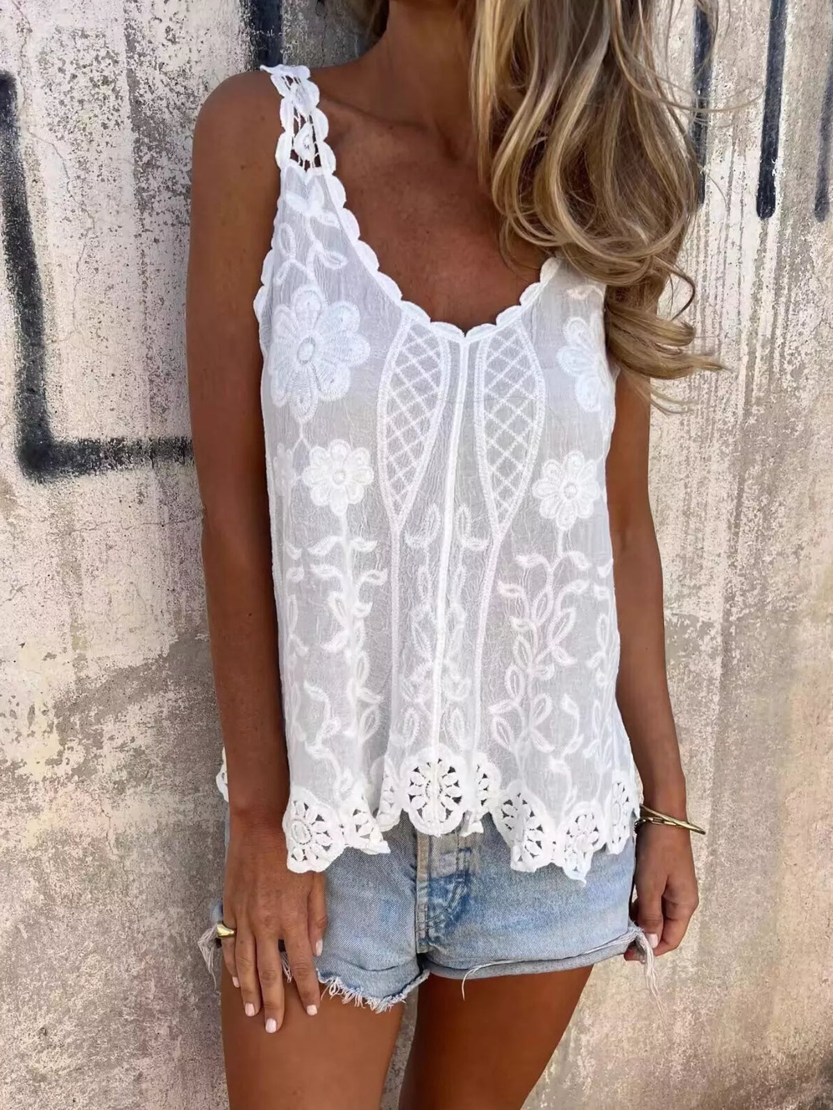 White floral lace tank top styled with denim