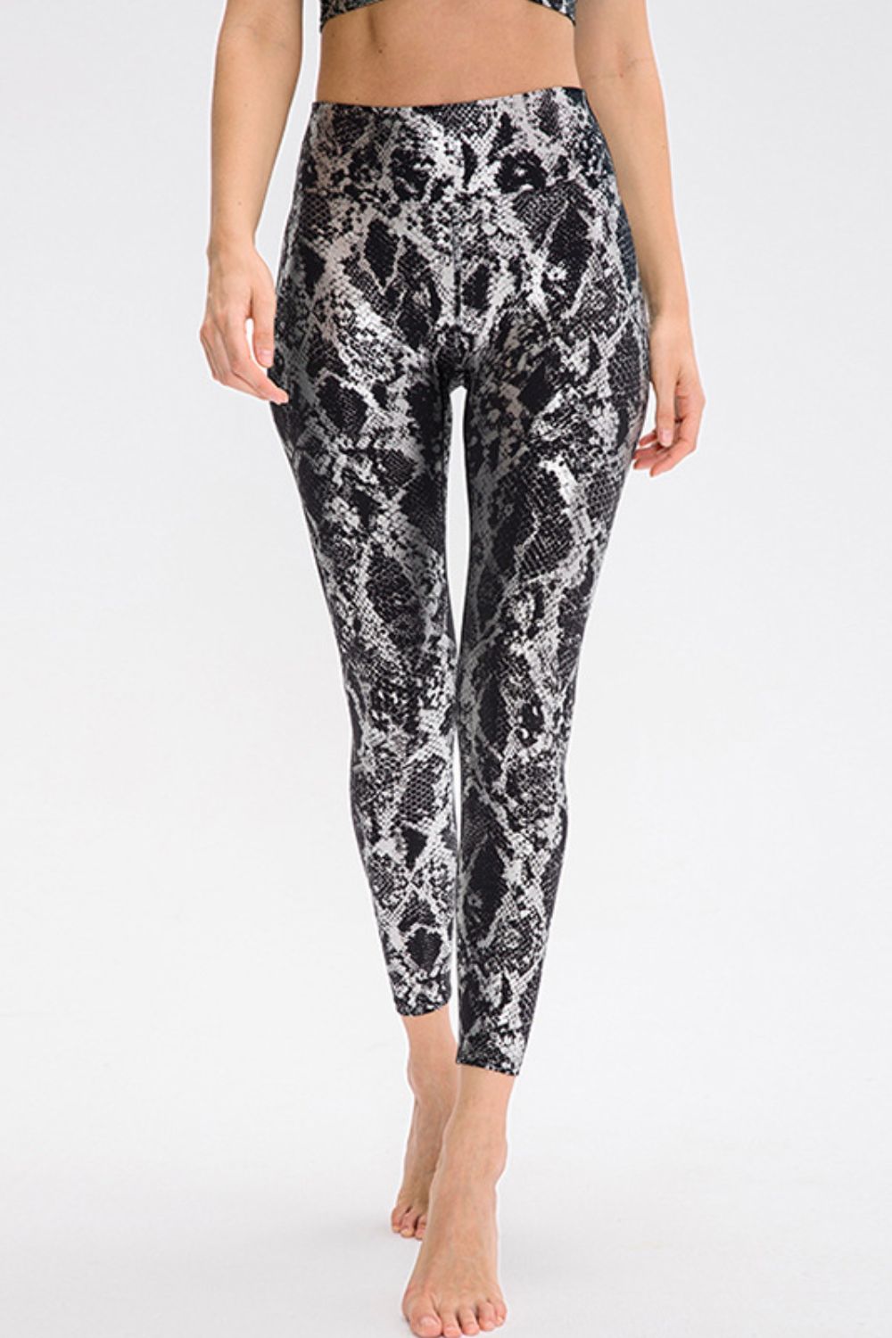 animal print slim fit sports pants close up detail