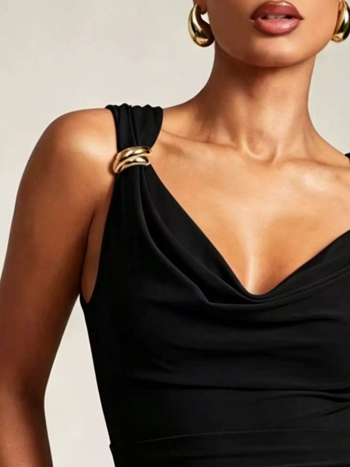 Black cowl neck tank with metal ring accents back view