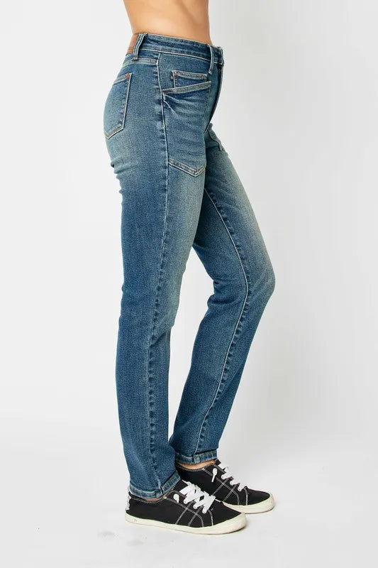 Close up of dark denim wash and waistband detail