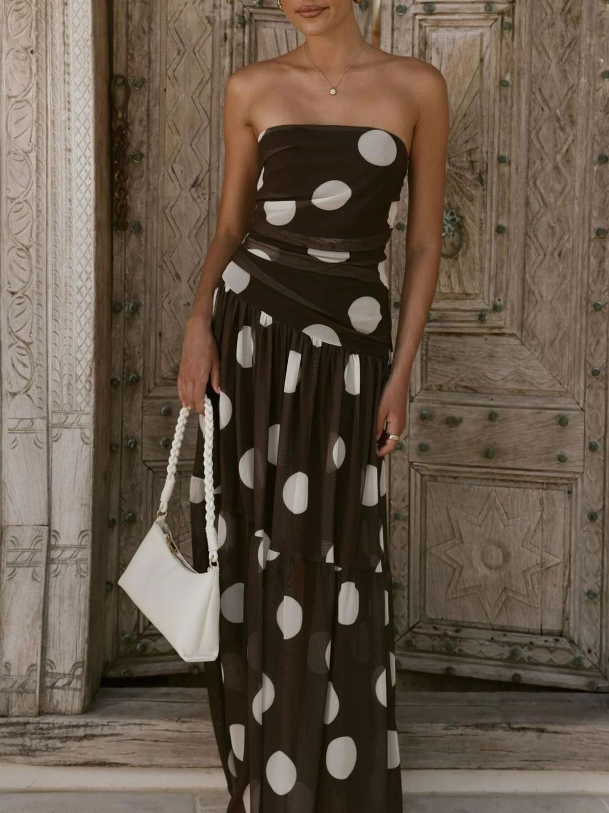 Polka dot strapless ruched maxi dress, skirt movement detail