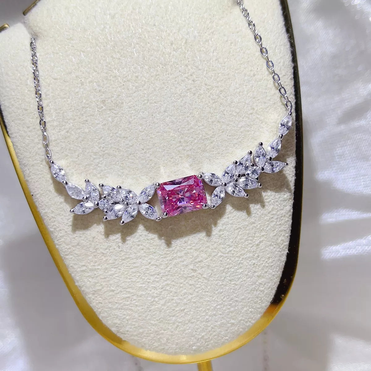 2 carat pink moissanite necklace in sterling silver, front view