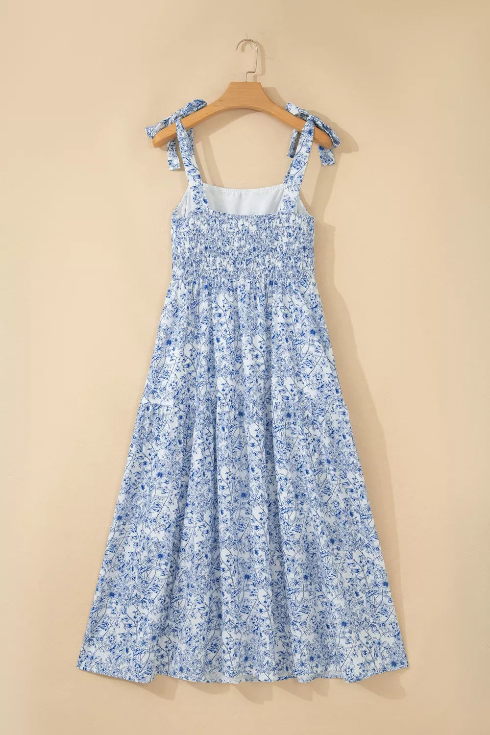 Light blue floral knot strap high waist flared maxi dress front view