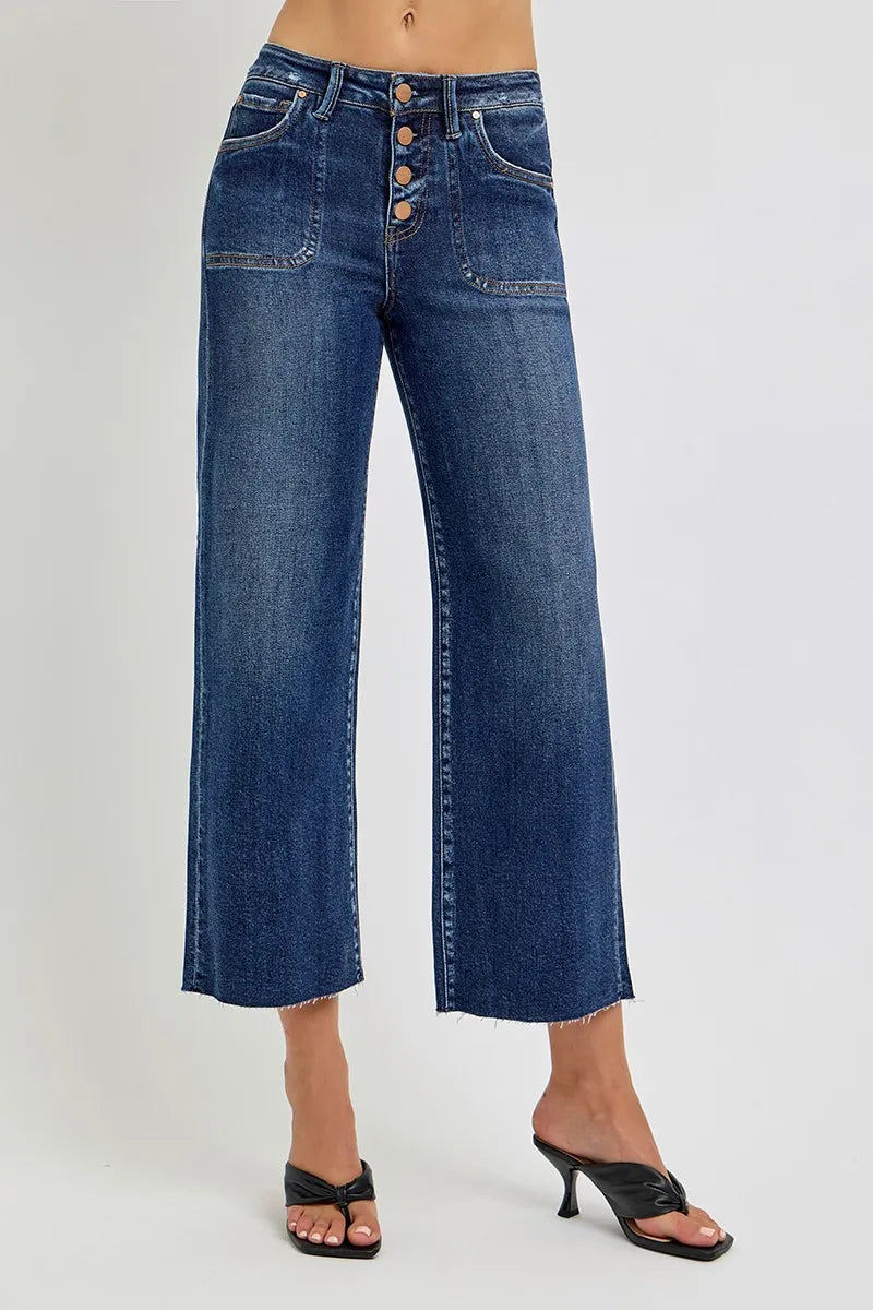 Medium wash wide leg jeans button fly detail