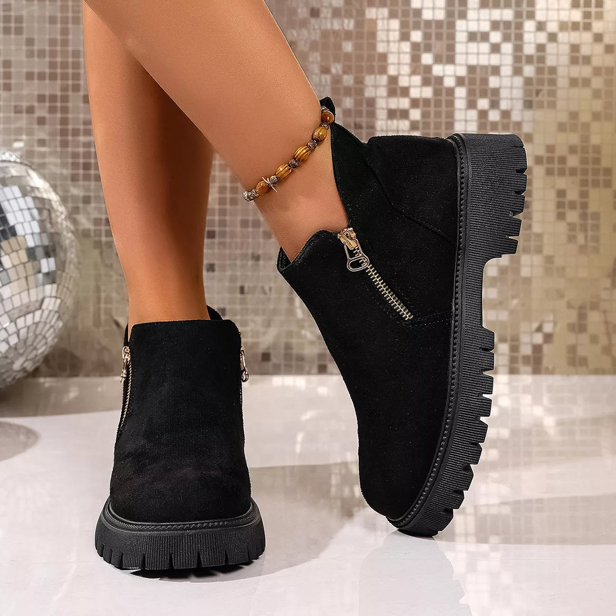 Round toe side zip ankle boots styled on model