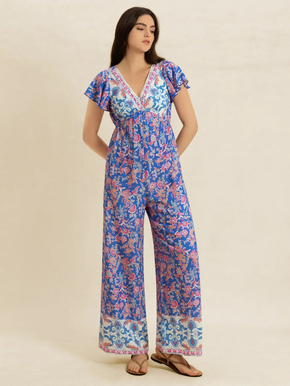 Printed v neck wide leg jumpsuit front view