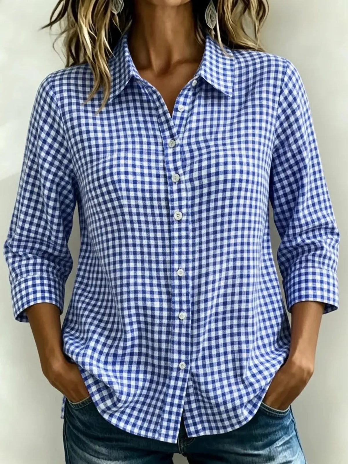 Plaid collared button up shirt front view on model