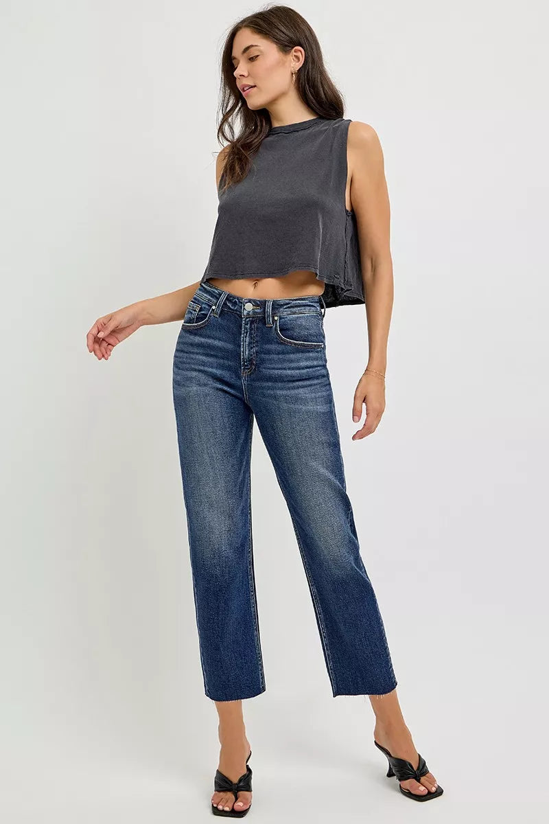 Model wearing RISEN high rise slim barrel jeans styled look